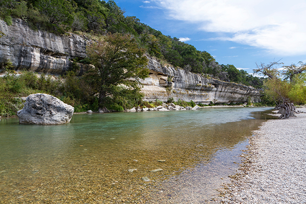 limestone formation next to a river