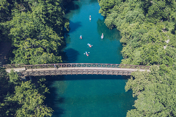 kayakers on river along the aquifer