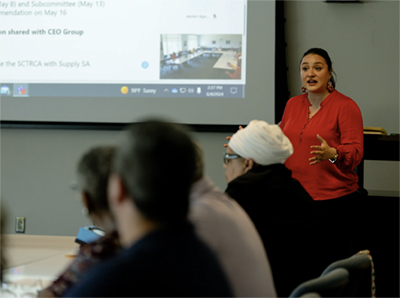 woman gives presentation