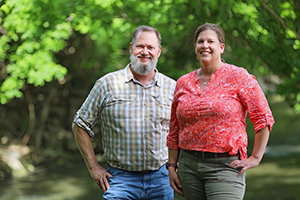 man and women in forest