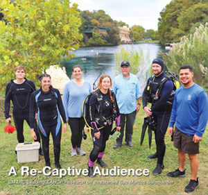 A Re captive audience group in wetsuits