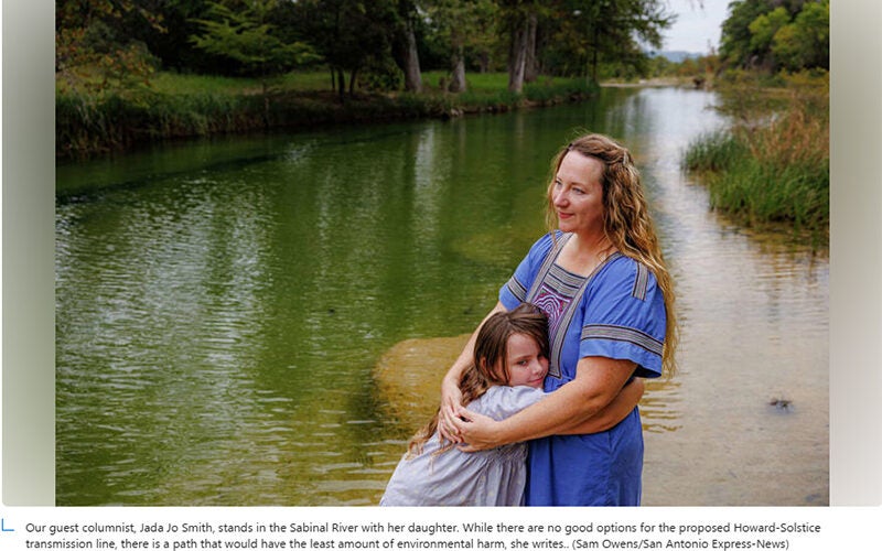 Our guest columnist, Jada Jo Smith, stands in the Sabinal River with her daughter_Sam Owens-San Antonio Express-News