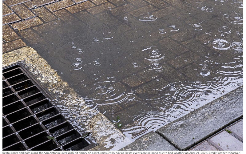 Restaurants and bars along the San Antonio River Walk sit empty on a wet, rainy, chilly day as Fiesta events are in limbo due to bad weather on April 21, 2026